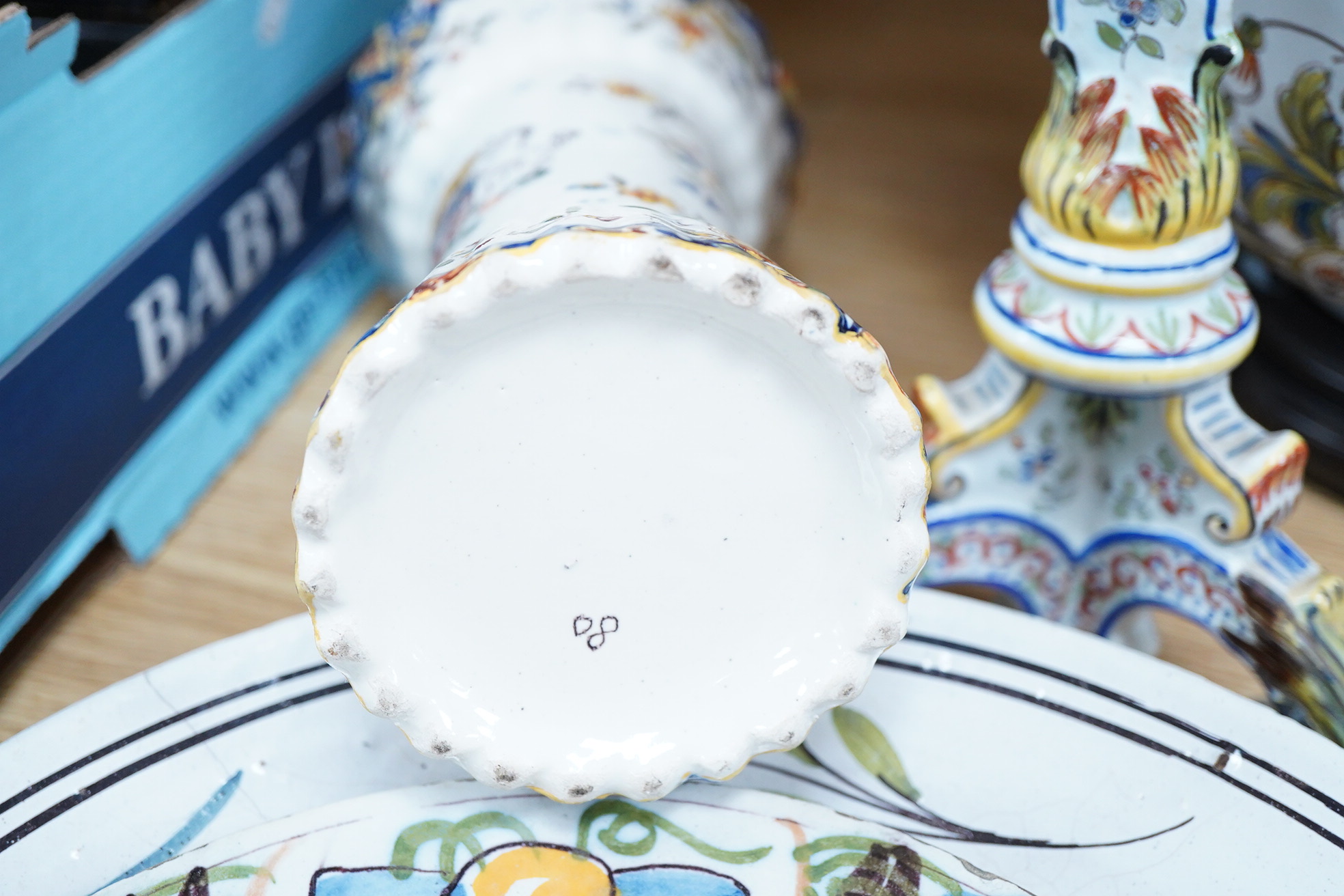 18th and 19th century faience including five chargers and large bowl, latter 30cm